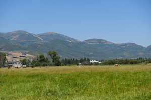 Property view of mountains featuring a rural view