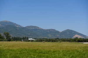 Property view of mountains featuring a rural view