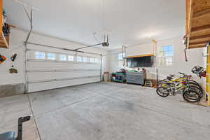 Garage featuring a garage door opener