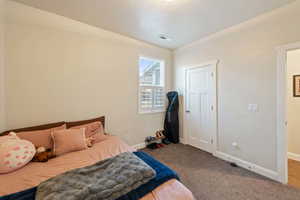 Bedroom featuring carpet