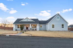 View of front of house with a front yard