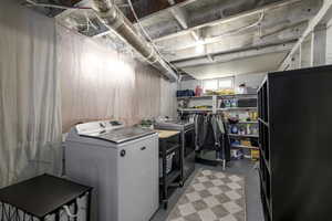 Laundry area with separate washer and dryer