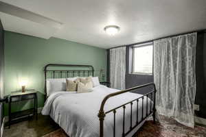 Bedroom featuring a textured ceiling