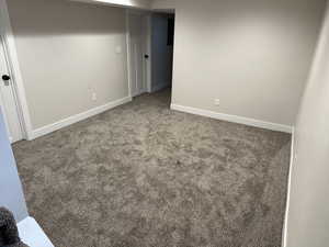 View of carpeted spare room