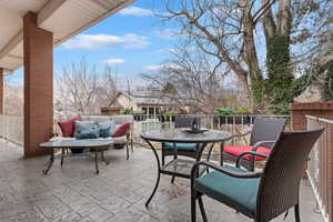 View of patio with an outdoor living space