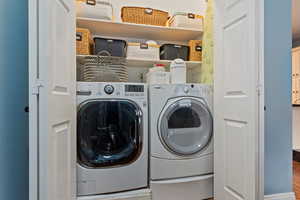 Laundry area featuring washing machine and dryer