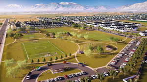 Birds eye view of property with a mountain view