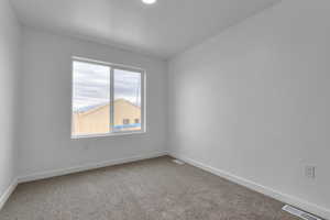 View of carpeted empty room