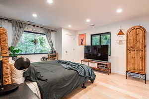 Bedroom featuring light hardwood / wood-style floors