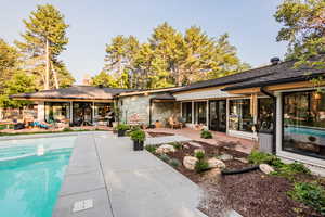 Rear view of house featuring a patio area