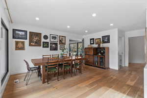 Dining room with light wood-type flooring