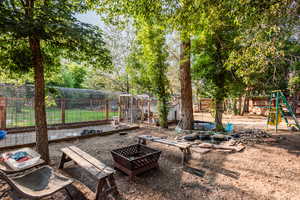 View of yard featuring a playground