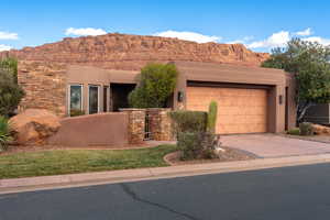 Pueblo-style house featuring a mountain view