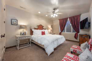 Bedroom with carpet floors and ceiling fan