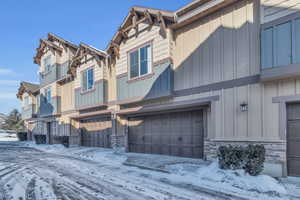 View of front of property featuring a garage