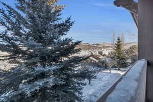 Snowy yard featuring a mountain view