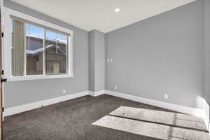 View of carpeted spare room