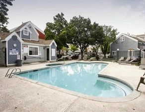 View of swimming pool with a patio