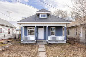 Bungalow-style home featuring covered porch