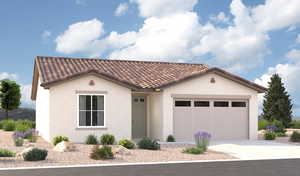 View of front of home with a garage