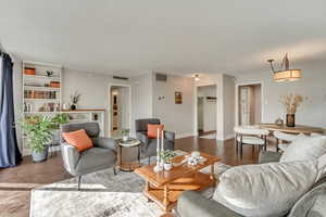 Living room with hardwood / wood-style floors