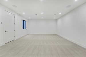 Empty room with light colored carpet