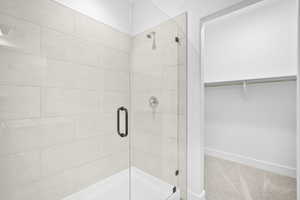 Bathroom with a shower with door