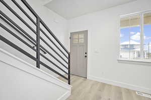 Foyer featuring light hardwood / wood-style flooring