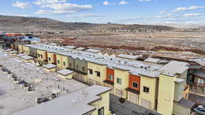 Snowy aerial view with a mountain view