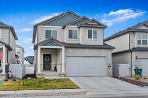 View of front of home with a garage