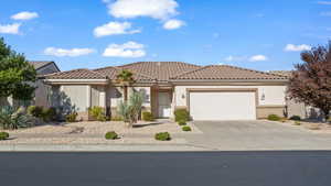 View of front of home featuring a garage