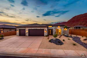 Prairie-style home with a mountain view and a garage