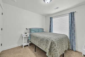 View of carpeted bedroom