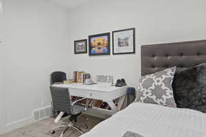 View of carpeted bedroom