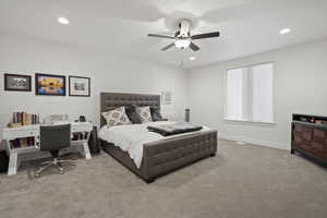 Bedroom with light carpet and ceiling fan