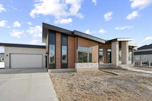Modern home featuring a garage