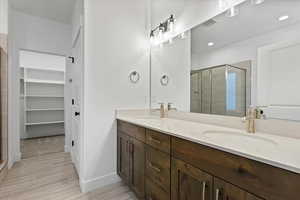 Bathroom with vanity and walk in shower