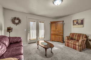 Living room with light carpet