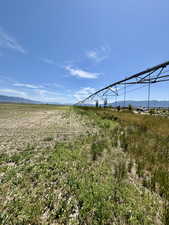 View of yard featuring a view of countryside and a mountain view