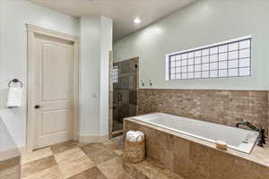 Bathroom with independent shower and bath