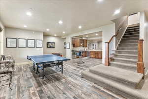 Recreation room featuring hardwood / wood-style floors