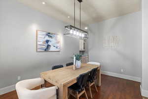 Dining space featuring dark hardwood / wood-style floors