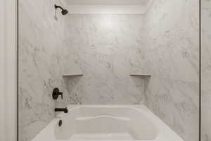 Bathroom with bathing tub / shower combination