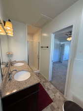 Bathroom featuring vanity and walk in shower