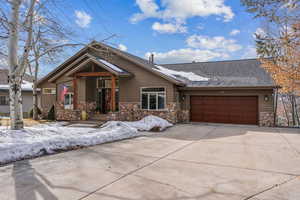 View of front of home featuring a garage