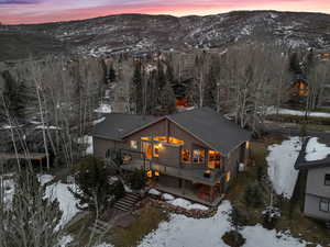 Snowy aerial view with a mountain view