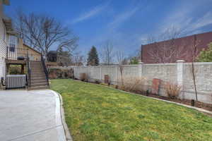 View of yard featuring central AC