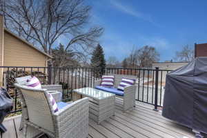 Wooden terrace with grilling area