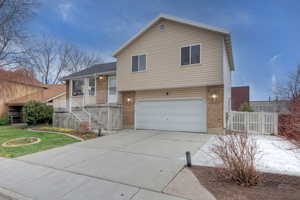 Tri-level home featuring a garage