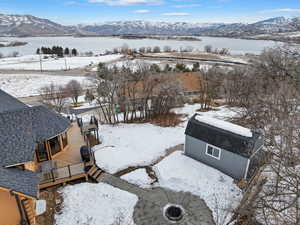 Snowy aerial view with a mountain view